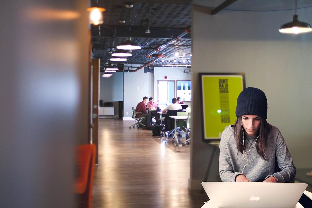 Person focusing deeply on a laptop